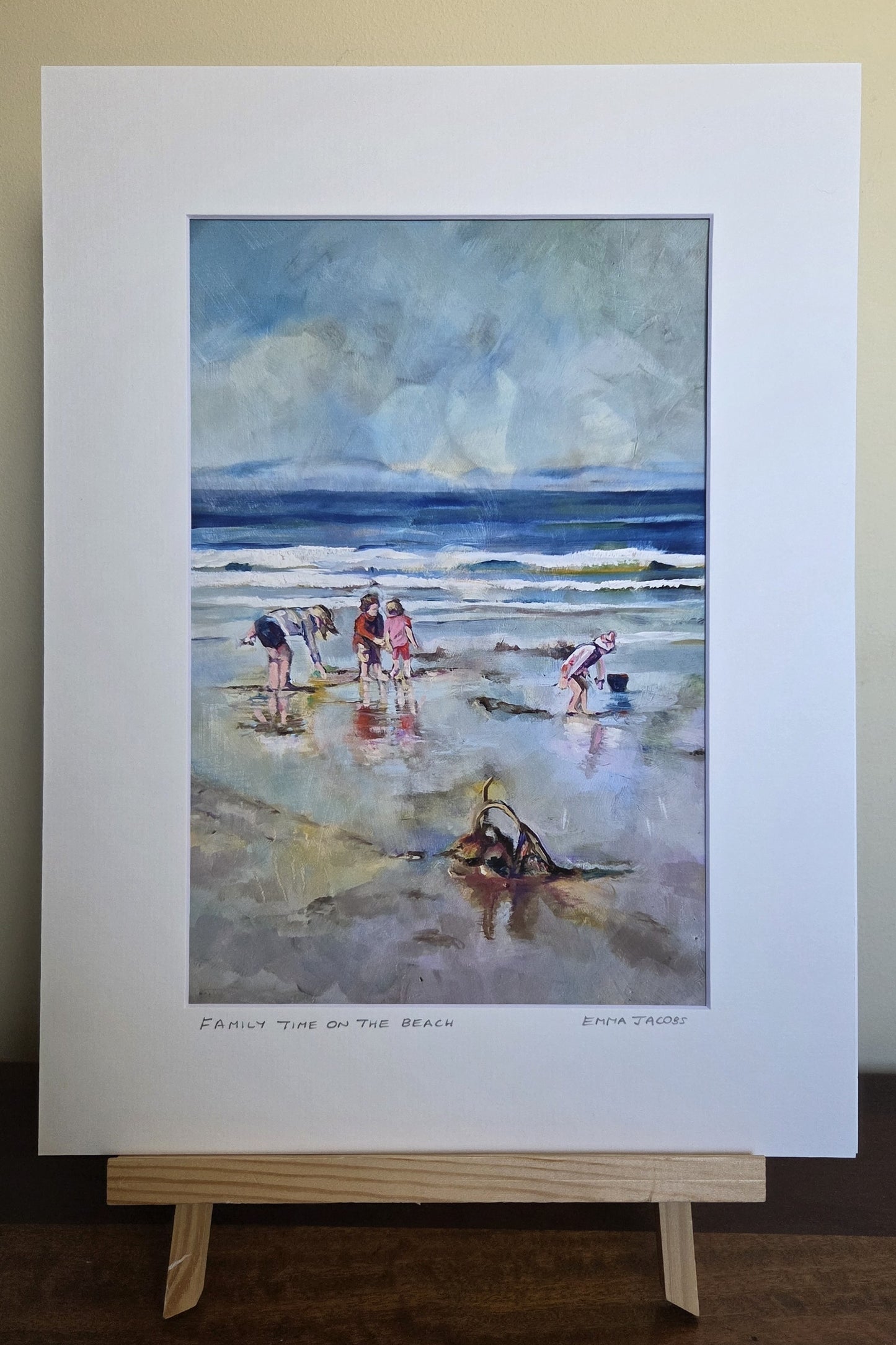 Mounted fine art print of a family having fun on a beach, coastal scene by Emma Jacobs