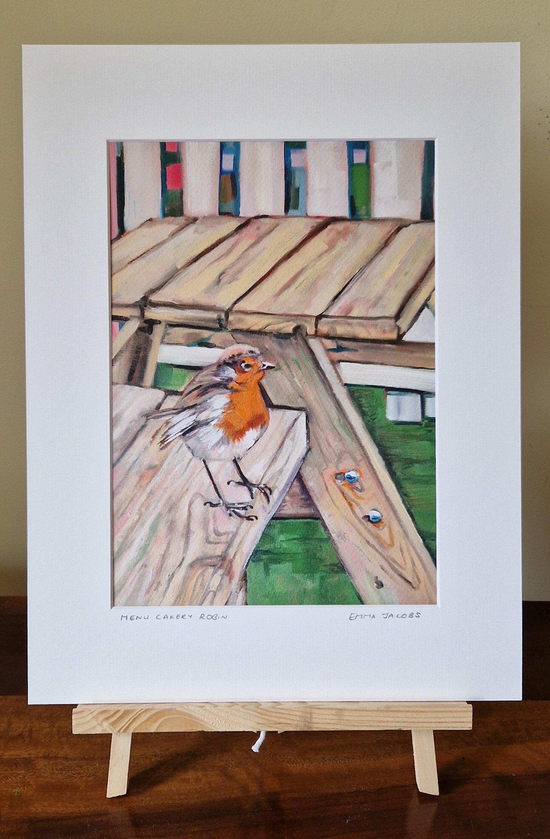 Mounted fine art print of a robin, at a local bakery by Irish artist Emma Jacobs